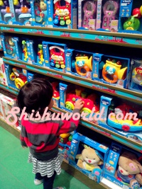 baby in toy shop